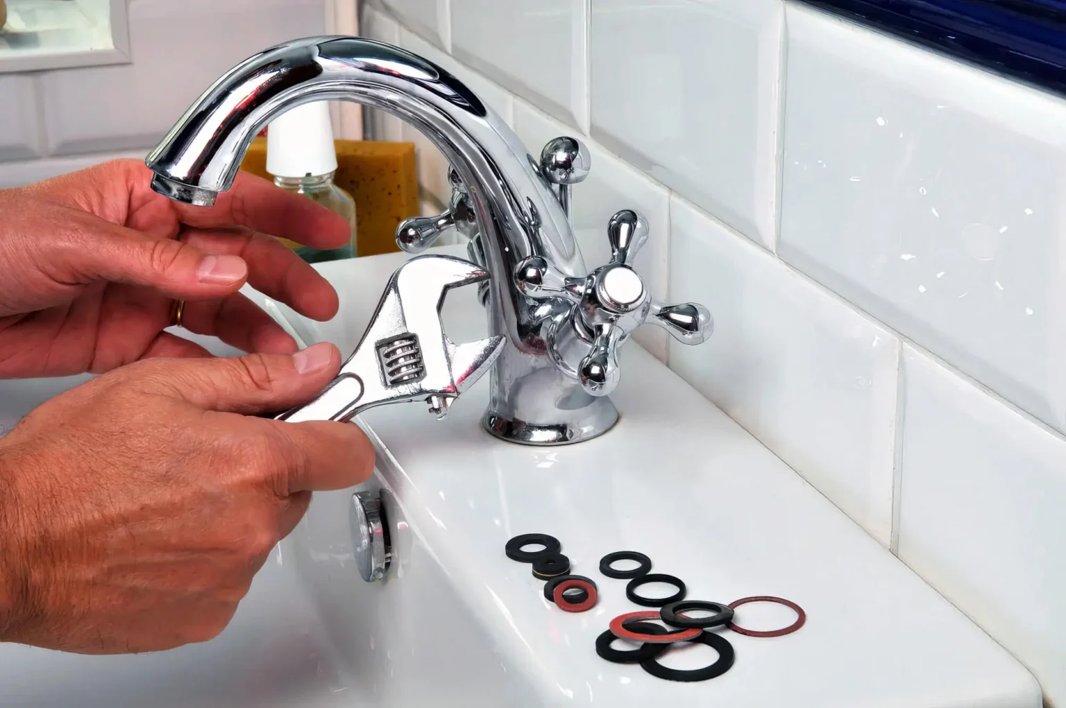 Plumber maintaining a bathroom faucet in Burlingame